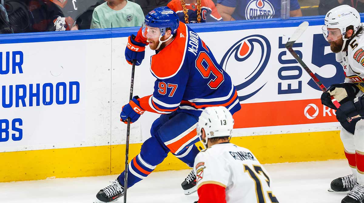 Edmonton Oilers center Connor McDavid (97) skates with the puck against the Florida Panthers during the second period in game five of the 2025 Stanley Cup Final at Rogers Place.