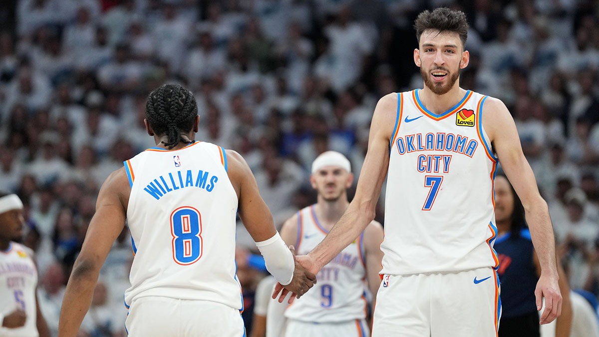 Oklahoma City Thunder forward Chet Holmgren (7) reacts with forward Jalen Williams (8) in the second half during game four of the western conference finals for the 2025 NBA Playoffs at Target Center.