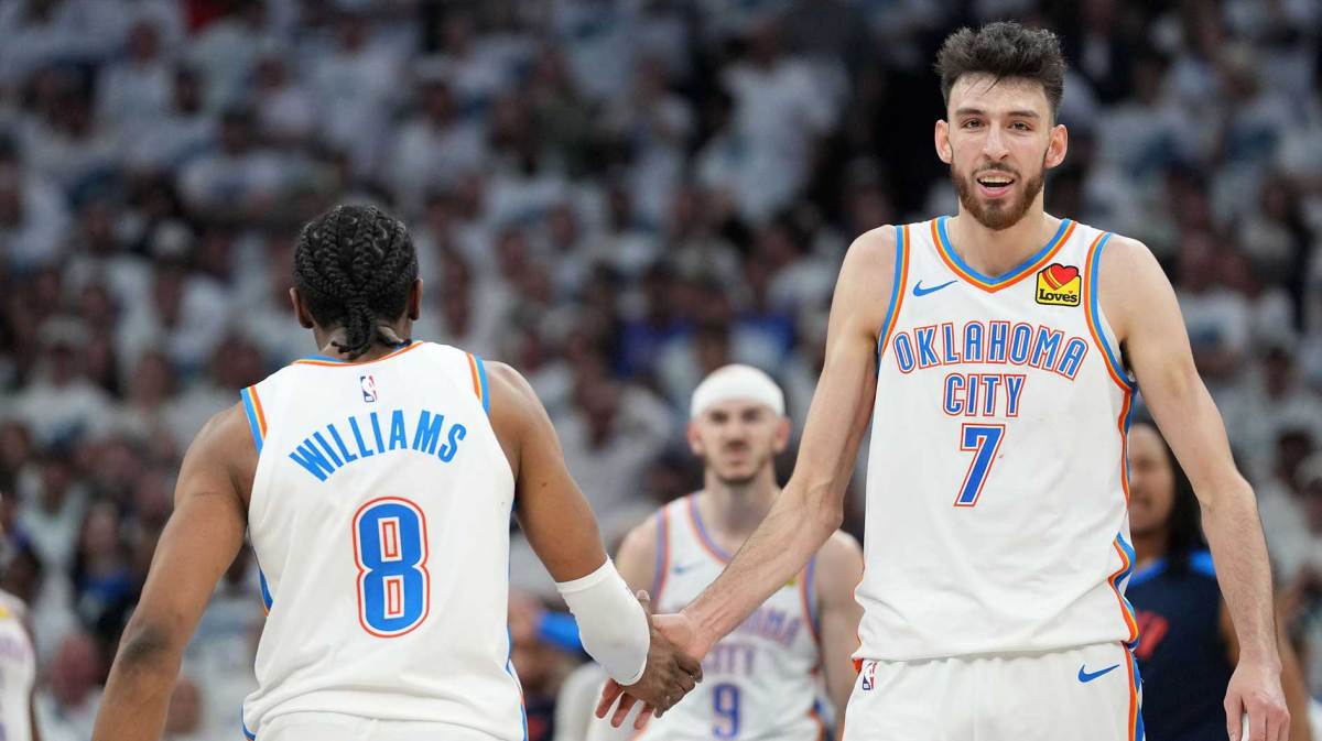 Oklahoma City Thunder forward Chet Holmgren (7) reacts with forward Jalen Williams (8) in the second half during game four of the western conference finals for the 2025 NBA Playoffs at Target Center.