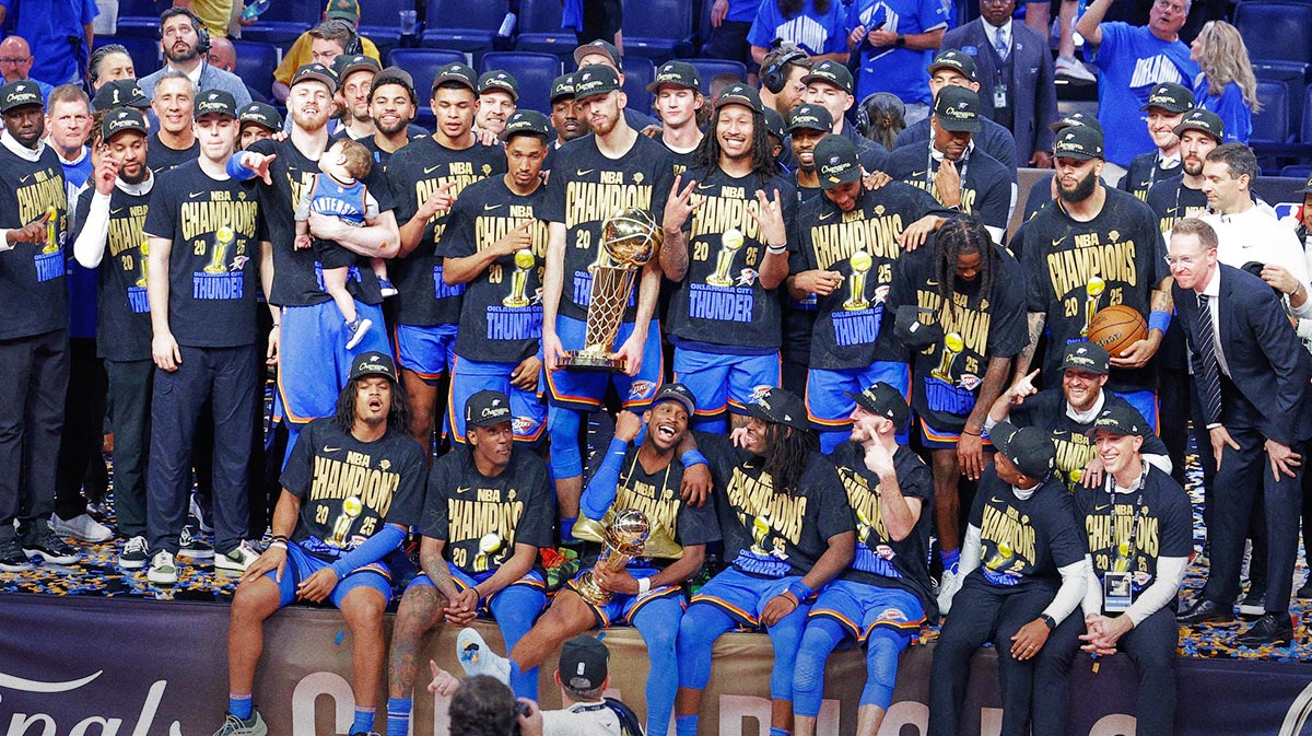 The Oklahoma City Thunder pose for a photo after winning the NBA Championship over the Indiana Pacers in game seven of the 2025 NBA Finals at Paycom Center.