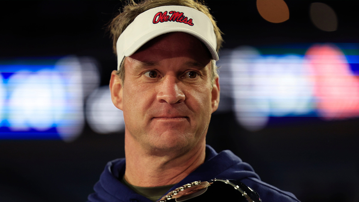 Mississippi Rebels head coach Lane Kiffin is interviewed after the game while holding the Ash Verlander Champions Trophy of the TaxSlayer Gator Bowl Thursday, Jan. 2, 2025 at EverBank Stadium in Jacksonville, Fla. Ole Miss defeated Duke 52-20.