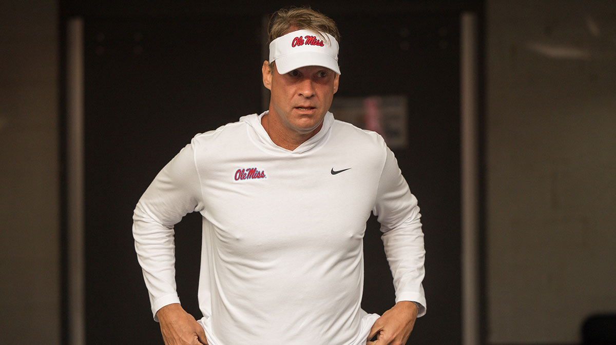 Mississippi Rebels head coach Lane Kiffin takes the field before a game against the LSU Tigers at Tiger Stadium.