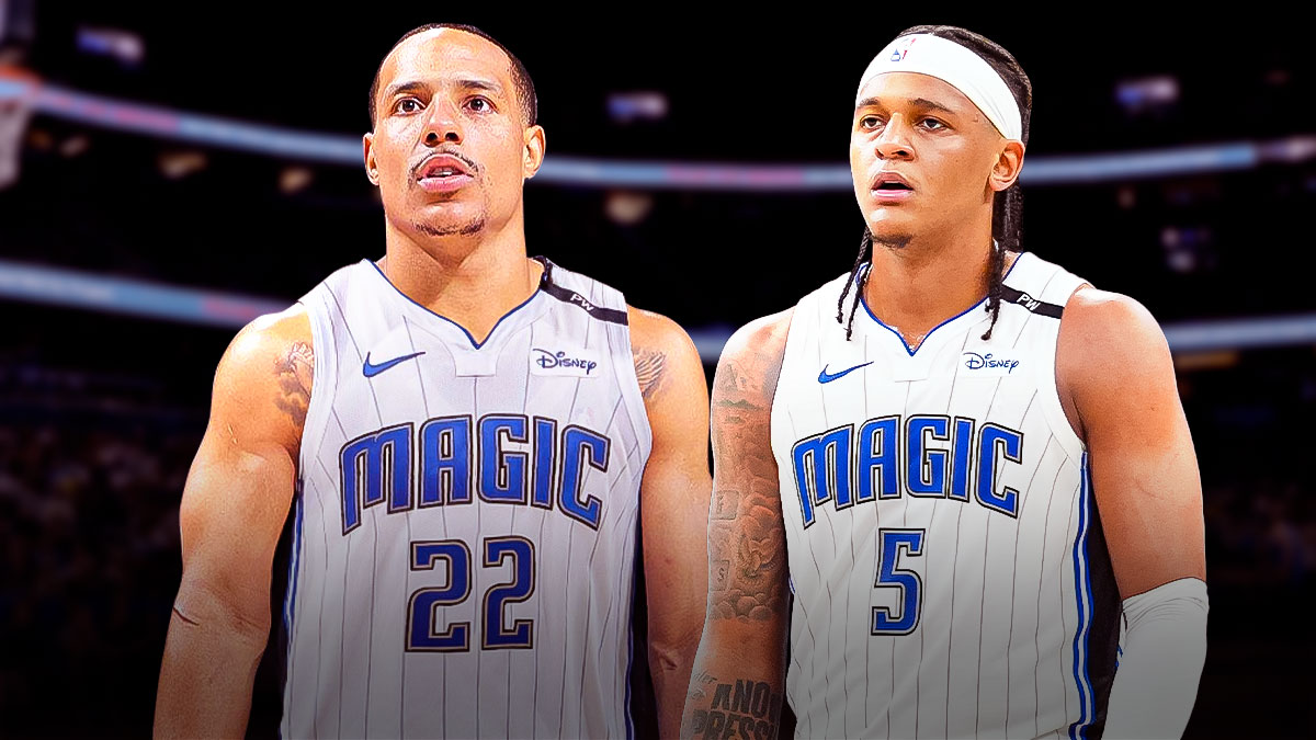 Desmond Bane in a Magic uniform next to Paolo Banchero on the Orlando court.