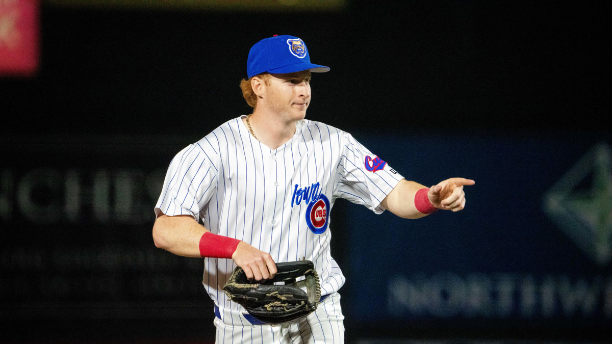 Iowa Cubs' Owen Caissie (17) makes his way to the dugout.