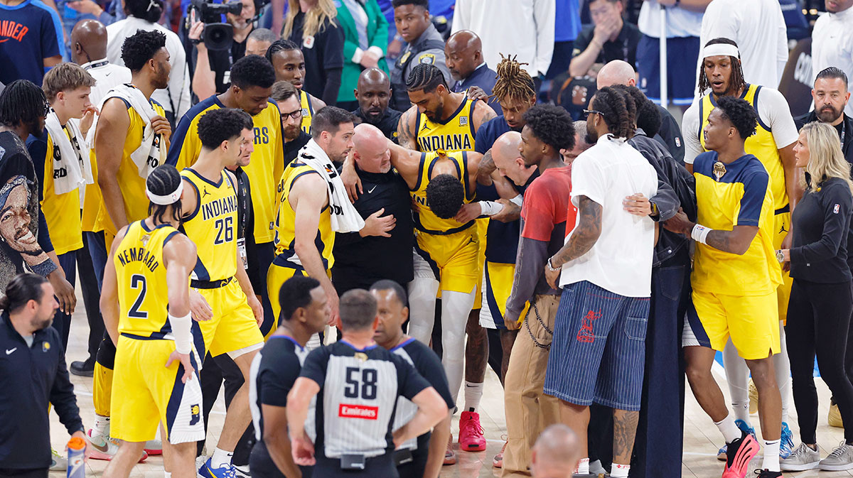 Indiana Pacers guard Tyrese Haliburton (0) is assisted after an apparent injury following a play against the Oklahoma City Thunder during the first half of game seven of the 2025 NBA Finals at Paycom Center. The Pacers move to the 2025-26 season without Tyrese Haliburton and Myles Turner.