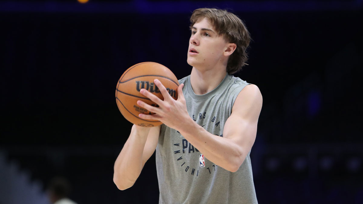 Indiana Pacers forward Johnny Furphy (12) warms up on the court before the game against the Atlanta Hawks at State Farm Arena.