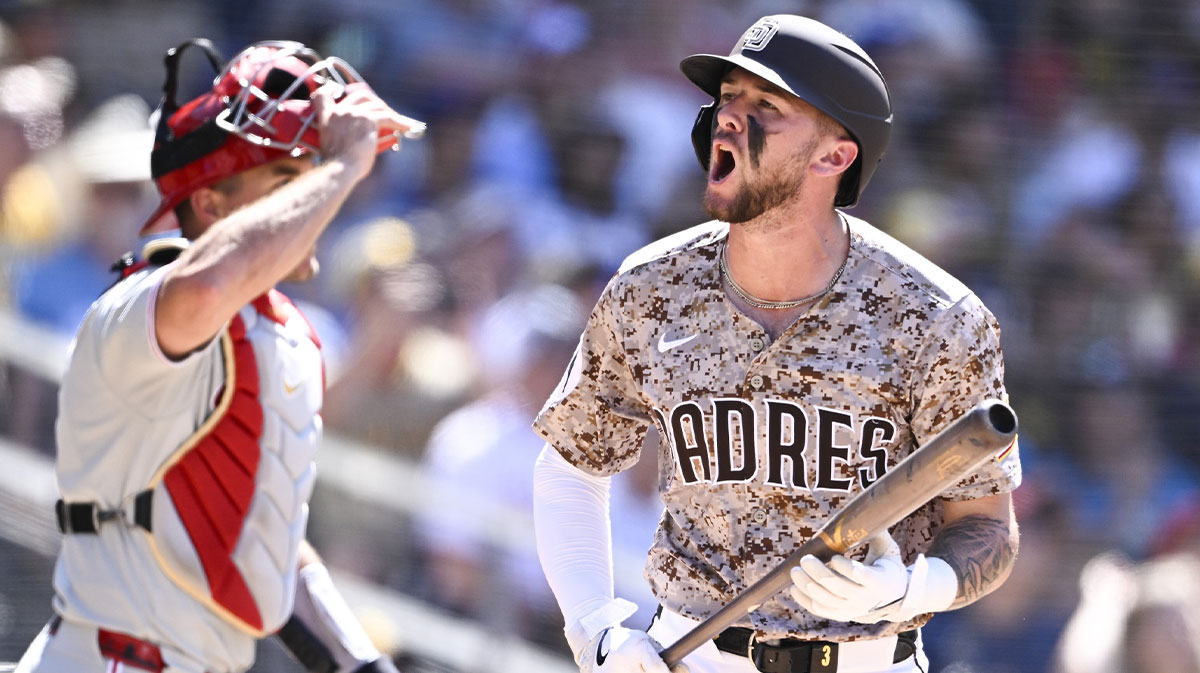 Padres center fielder Jackson Merrill (3) reacts after hitting a fly ball