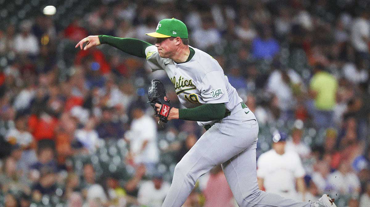 Athletics relief pitcher Mason Miller (19) delivers a pitch during the ninth inning against the Houston Astros at Daikin Park.