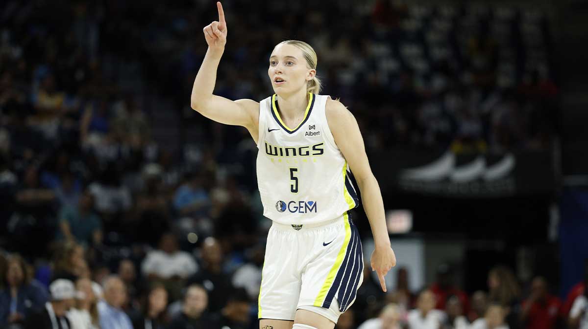 Dallas Wings guard Paige Bueckers (5) reacts after scoring against the Chicago Sky during the first half at Wintrust Arena.