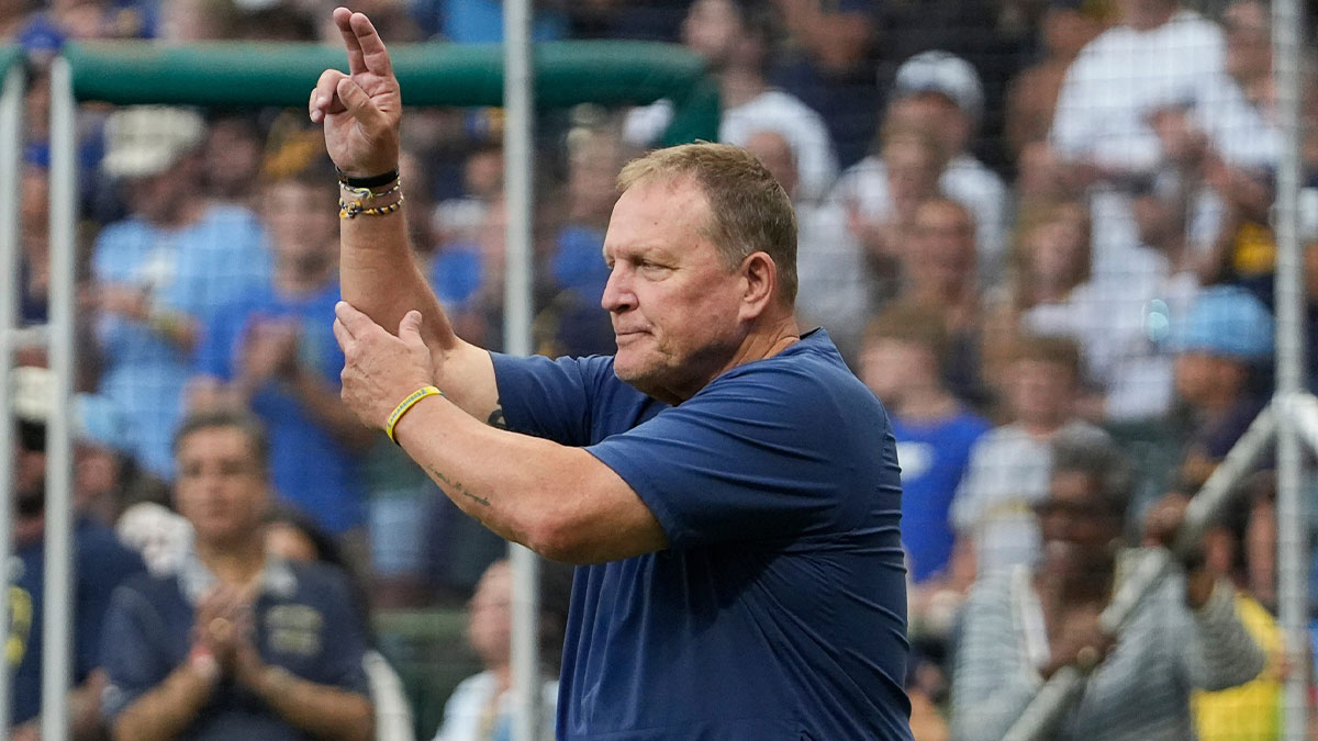 Brewers manager Pat Murphy signals for a pitcher change during the 25 season Alumni Home Run Derby.