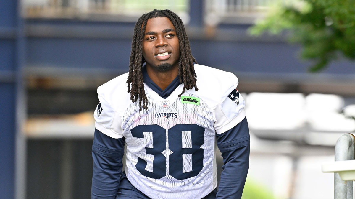 Patriots running back Rhamondre Stevenson (38) walks to the practice fields at Gillette Stadium