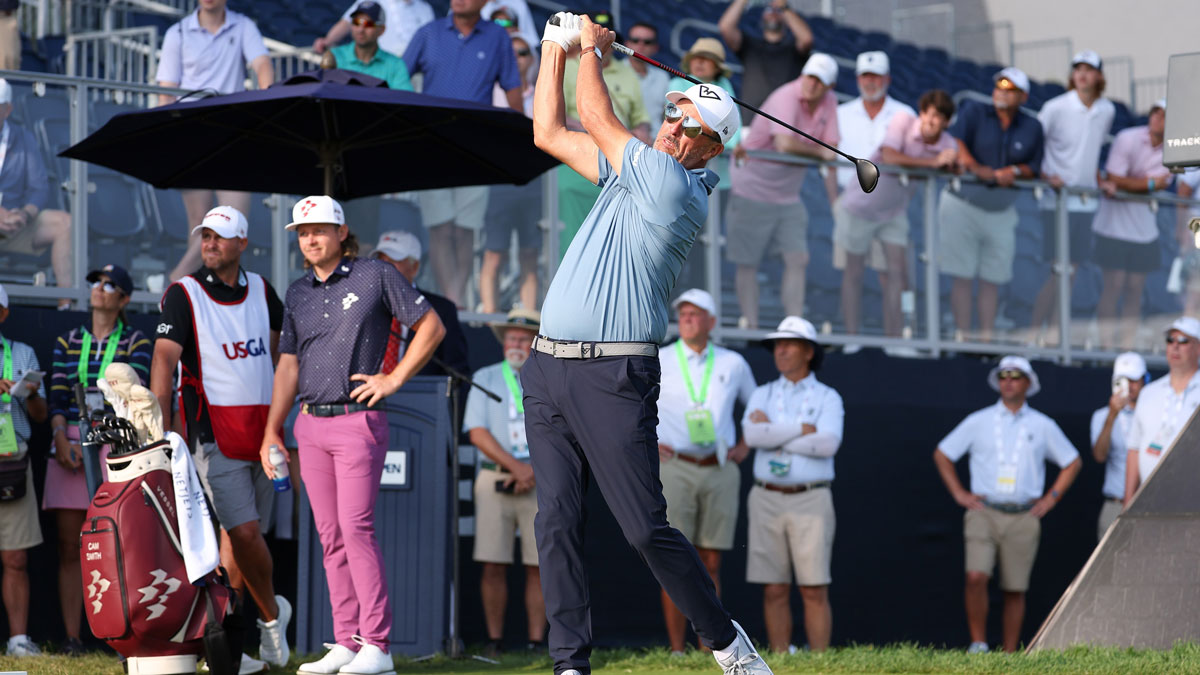 Phil Mickelson plays his shot from the tenth tee during the first round of the U.S. Open golf tournament.