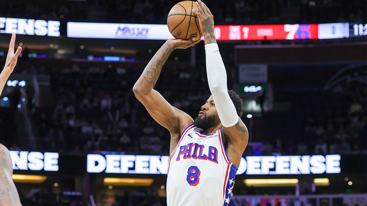 Philadelphia 76ers forward Paul George (8) shoots during the first quarter against the Orlando Magic at Kia Center.