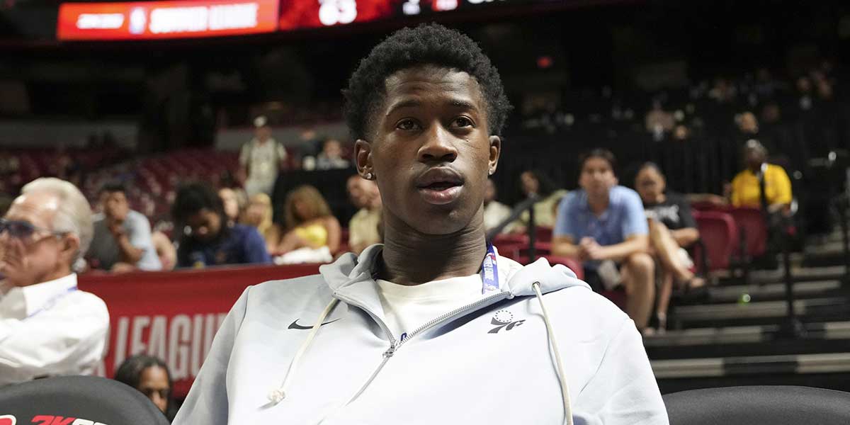 Philadelphia 76ers guard VJ Edgecombe (77) watches the game against the San Antonio Spurs from the baseline at Thomas & Mack Center.