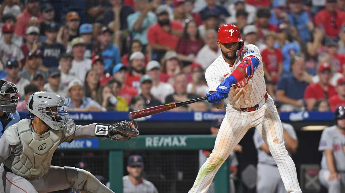 Boston Red Sox catcher Carlos Narváez (75) is called for catcher's interference against Philadelphia Phillies second base Edmundo Sosa (33) during the tenth inning that gave the Phillies the winning run at Citizens Bank Park.