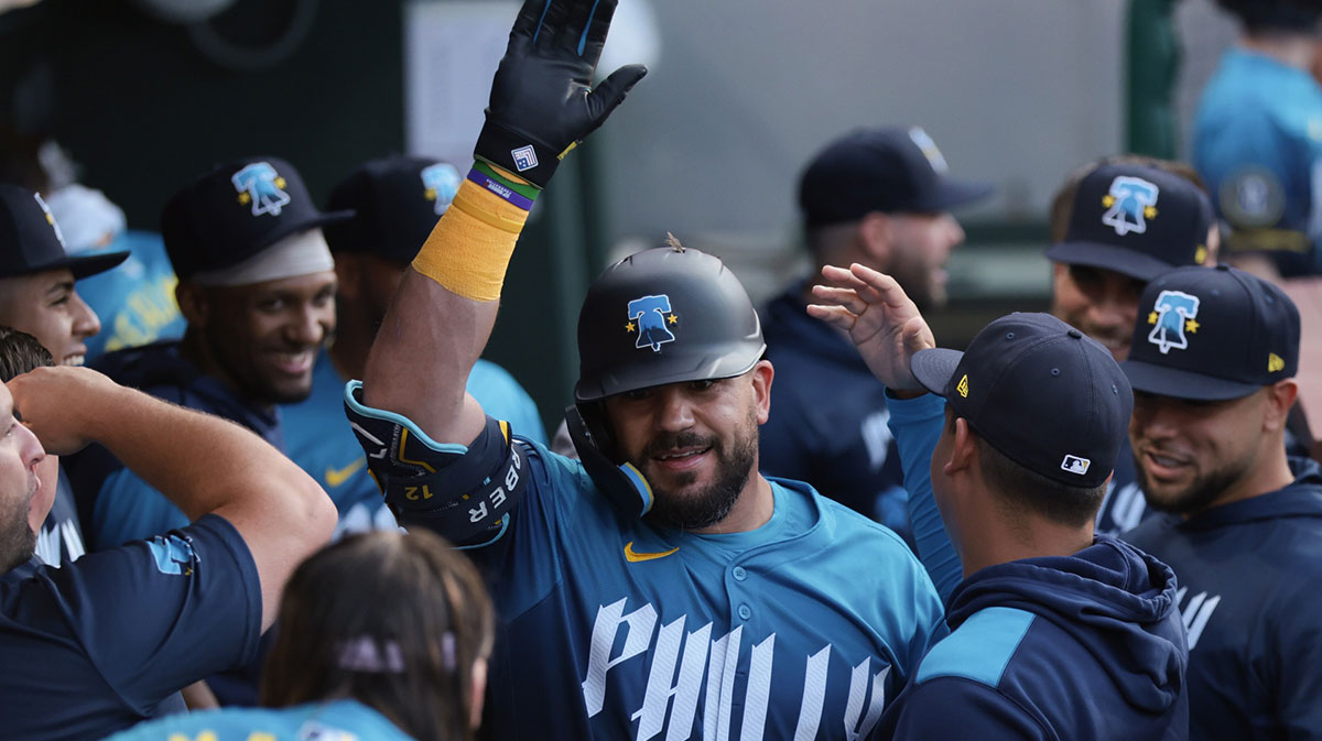 Philadelphia Phillies outfielder Kyle Schwarber (12) celebrates in the dugout after hitting a home run against the Los Angeles Angels during the first inning at Citizens Bank Park.
