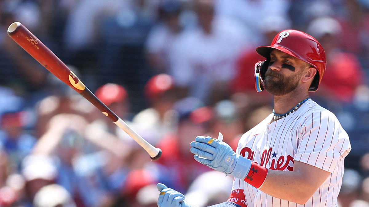 Philadelphia Phillies first base Bryce Harper (3) tosses his bat after striking out to end the sixth inning against the Cincinnati Reds at Citizens Bank Park. Phillies 1B Bryce Harper calls out umpire Phil Cuzzi after ugly loss.