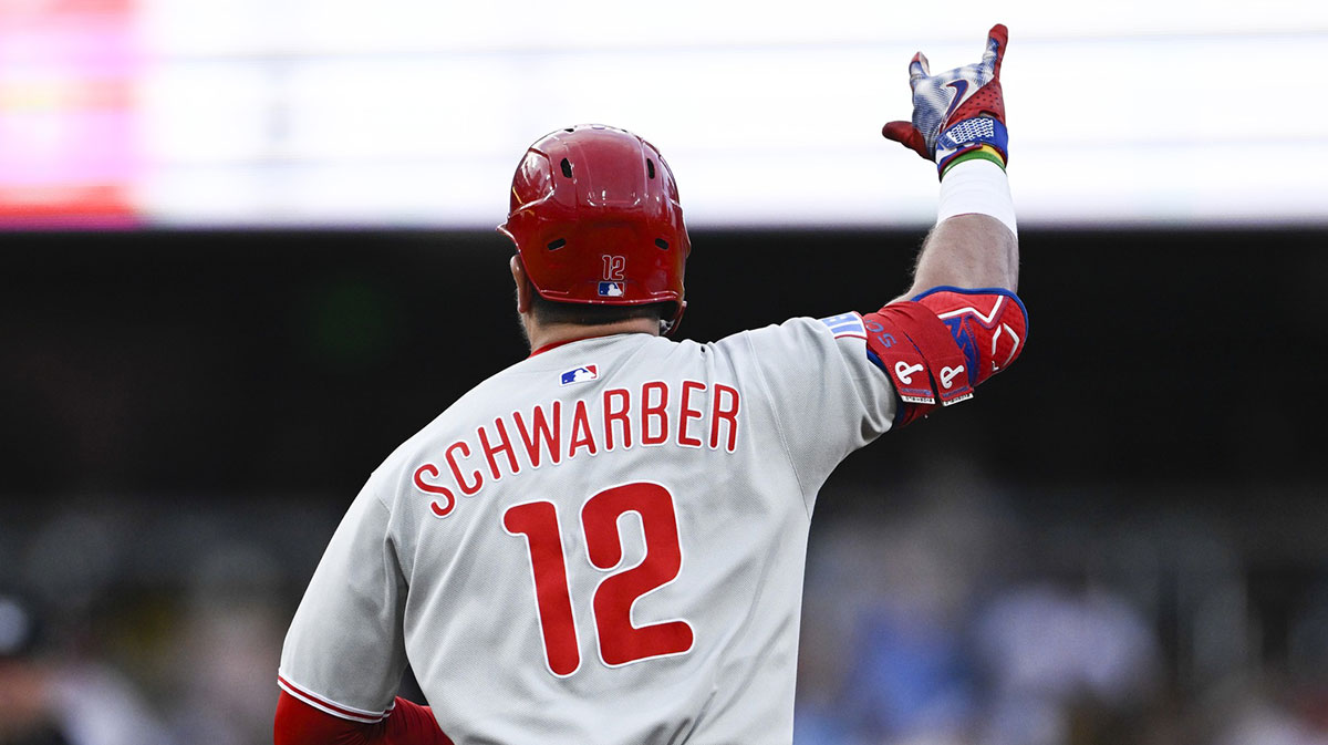 Philadelphia Phillies left fielder Kyle Schwarber (12) rounds the bases after hitting a solo home run during the third inning against the San Diego Padres at Petco Park.