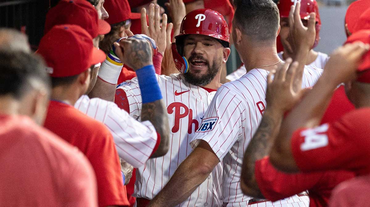 Philadelphia Phillies outfielder Kyle Schwarber (12) celebrates with teammates after hitting a grand slam during the sixth inning against the Los Angeles Angels at Citizens Bank Park. Kyle Schwarber impressed many during the MLB All-Star game, earning a Hall of Fame request for his bat.