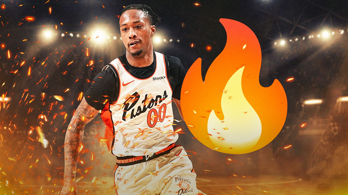 Ron Holland with flame emojis at basketball gym