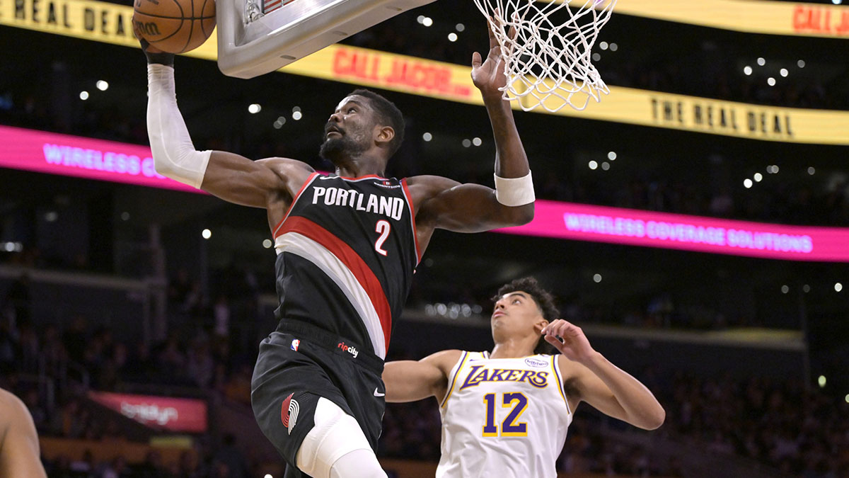 Portland Trail Blazers center Deandre Ayton (2) reaches for a pass in front of Los Angeles Lakers guard Max Christie (12) in the first half at Crypto.com Arena.