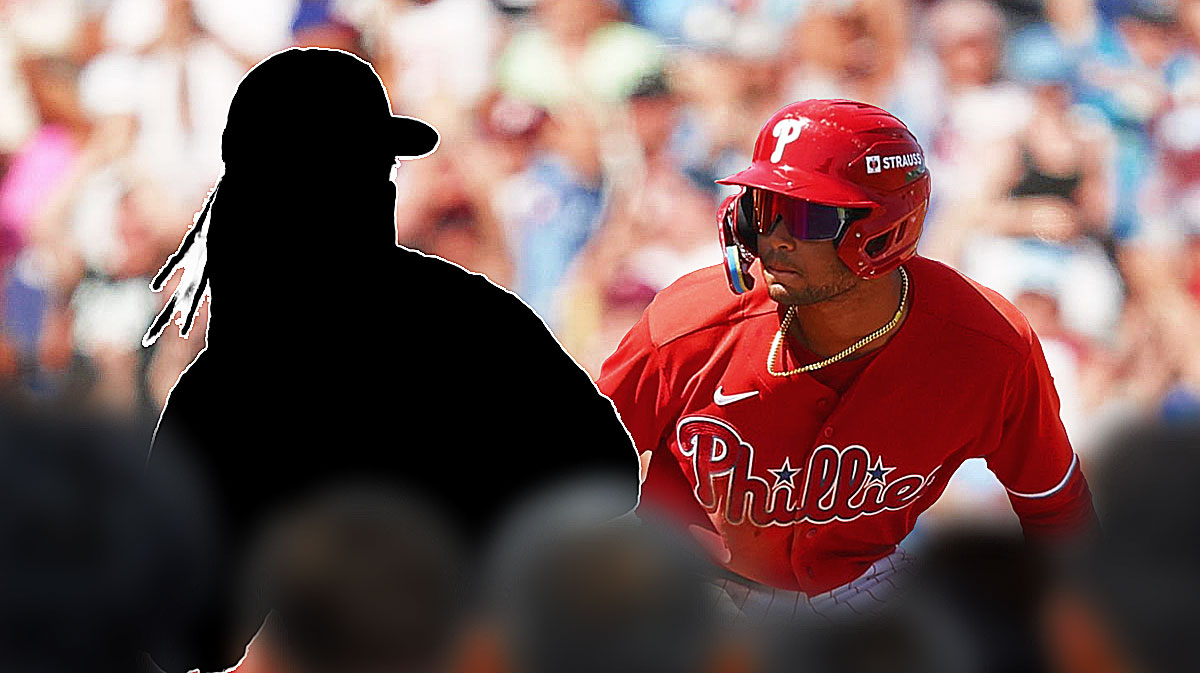 Silhouette of Emmanuel Clase (Guardians) pitching, Citizens Bank Park (Phillies) background with Phillies prospect Justin Crawford