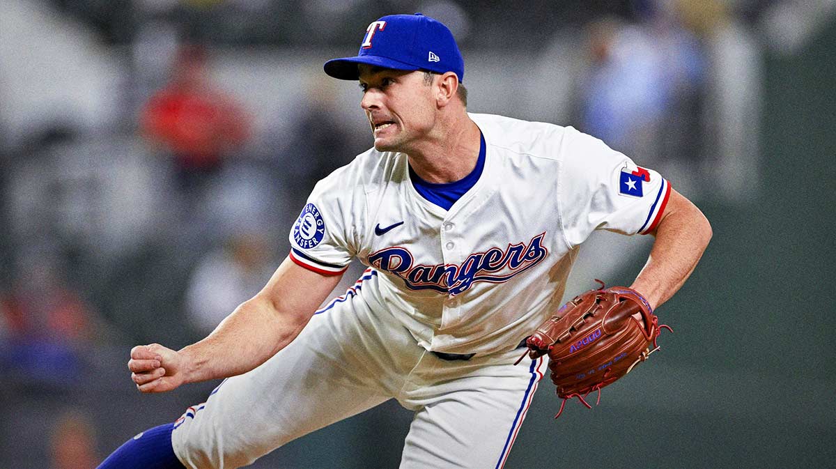 Texas Rangers relief pitcher David Robertson (37) pitches against the Los Angeles Angels during the game at Globe Life Field.