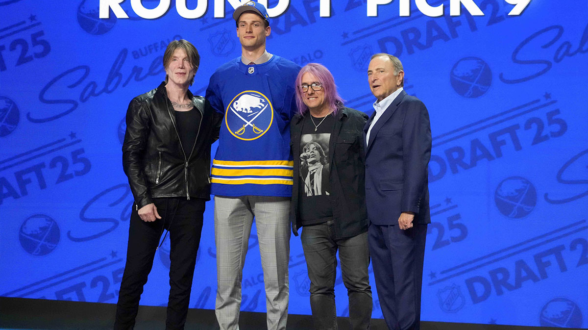 Radim Mrtka (second from left) poses with John Rzeznik (left) and Robby Takac (second from right) of the Goo Goo Dolls and NHL commissioner Gary Bettman (right) after being selected as the ninth overall pick to the Buffalo Sabres in the first round of the 2025 NHL Draft at Peacock Theater.