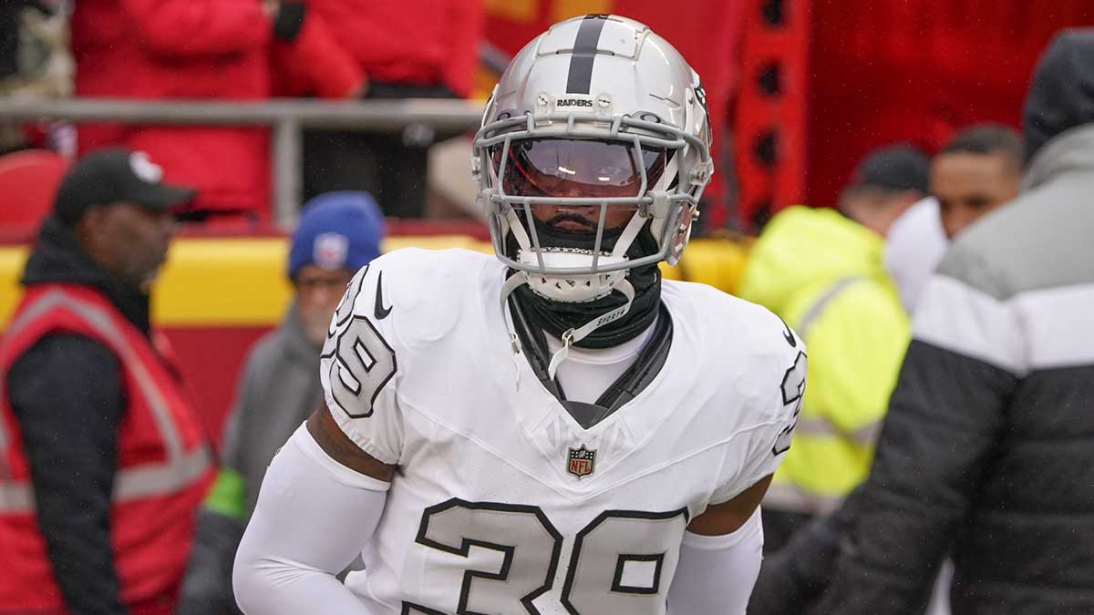 Las Vegas Raiders cornerback Nate Hobbs (39) runs onto the field against the Kansas City Chiefs prior to a game at GEHA Field at Arrowhead Stadium.