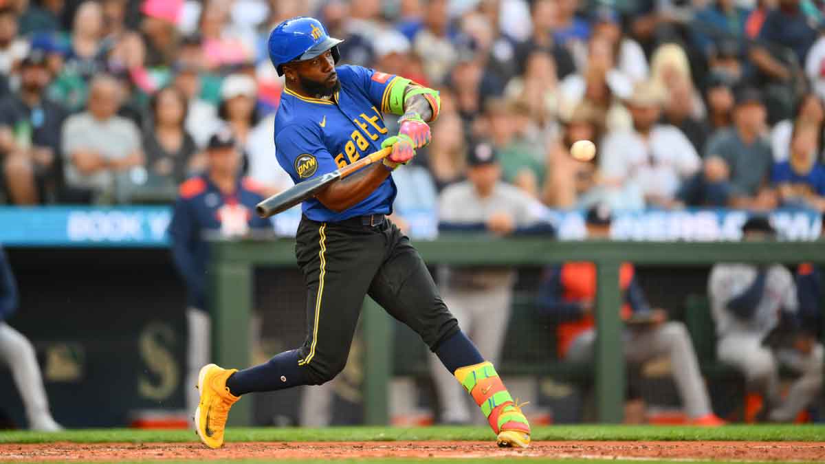 Seattle Mariners left fielder Randy Arozarena (56) hits a home run against the Houston Astros during the fourth inning at T-Mobile Park. 