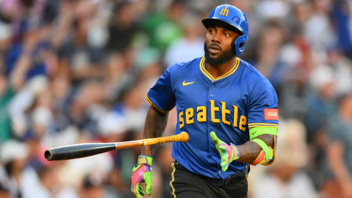 Seattle Mariners left fielder Randy Arozarena (56) tosses his bat after hitting a home run against the Houston Astros during the fourth inning at T-Mobile Park.