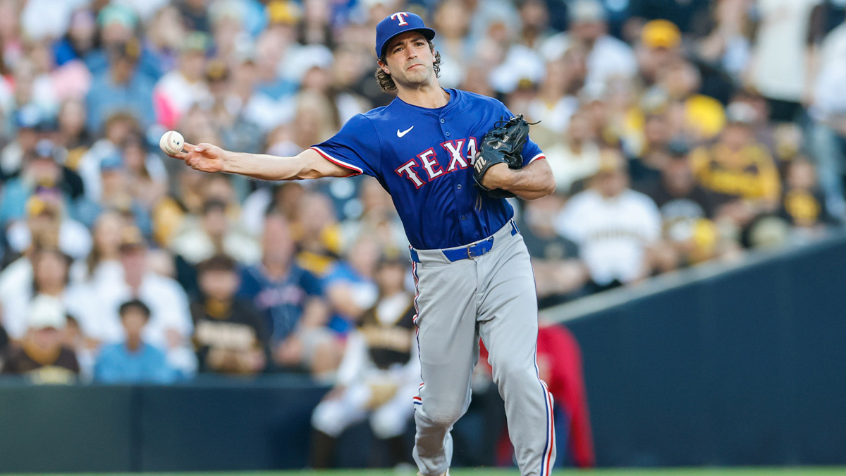Texas Rangers third baseman Josh Smith (8) throws to first base for an out during the second inning against the San Diego Padres at Petco Park.