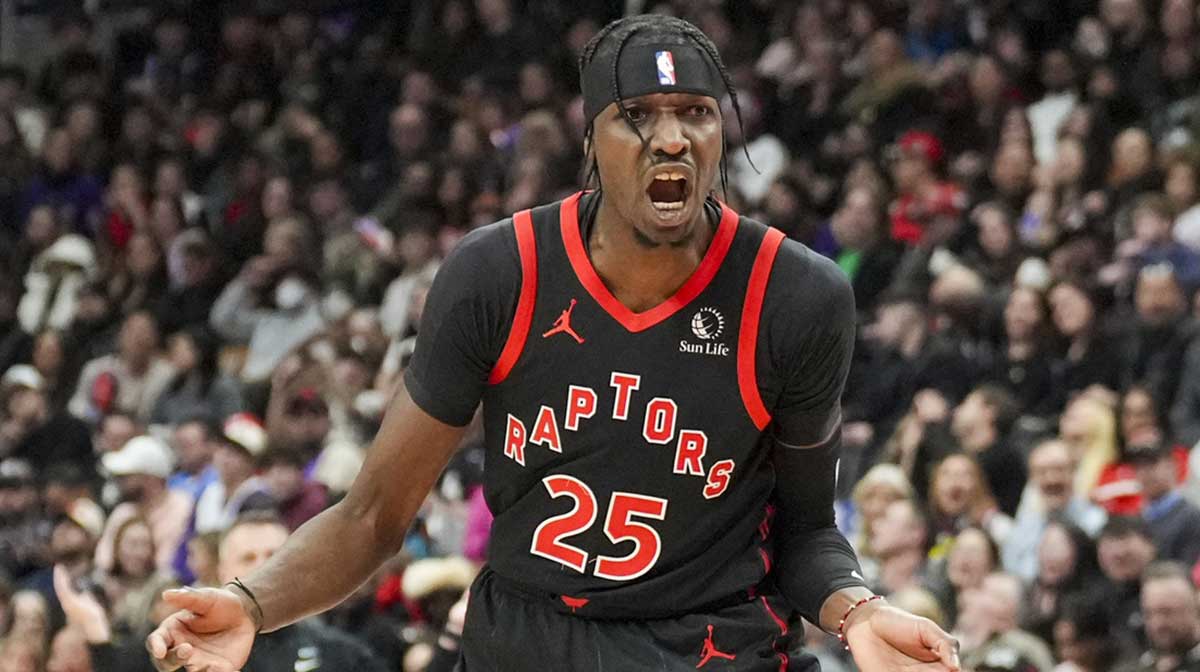 Toronto Raptors forward Chris Boucher (25) reacts during a NBA game against the Miami Heat at Scotiabank Arena.