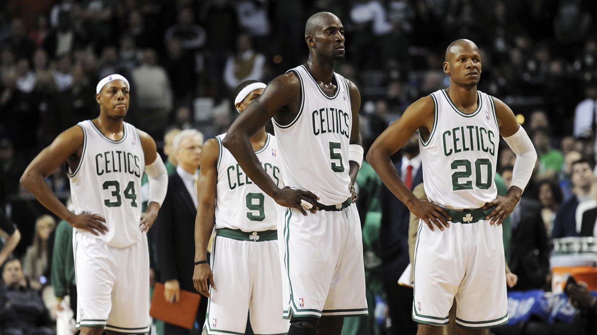 The players of Boston Celtics Paul Pierce (34), Rajon Rondo (9), Kevin Garnett (5) and Ray Allen (20) await the start of extensions against New York Knicks at TD Garden.
