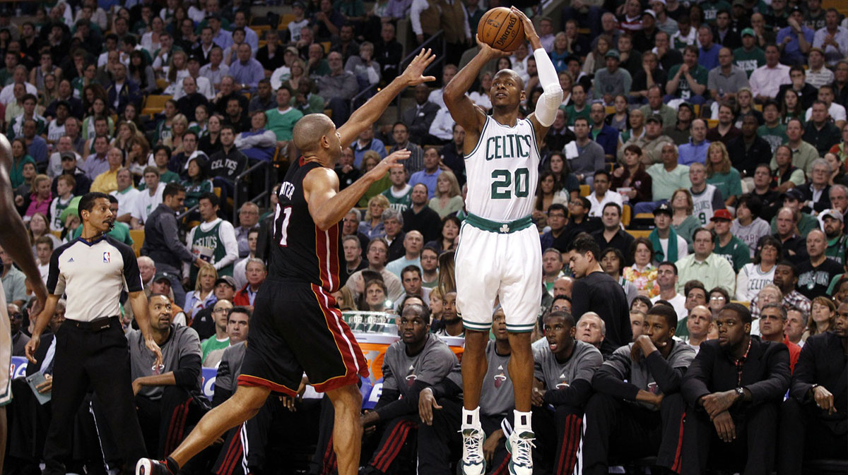 Boston Celtics shooting guard Ray Allen (20) takes a shot while guarded by Miami Heat small forward Shane Battier (31) during the second half in game four of the Eastern Conference finals of the 2012 NBA playoffs at TD Garden.