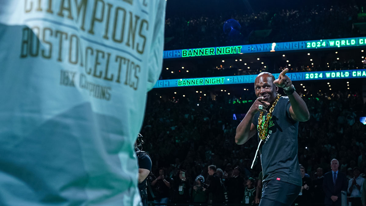 Former NBA Champion and Boston Celtics player Ray Allen walks onto the court during the opening night banner raising ceremony before the start of the game against the New York Knicks at TD Garden.