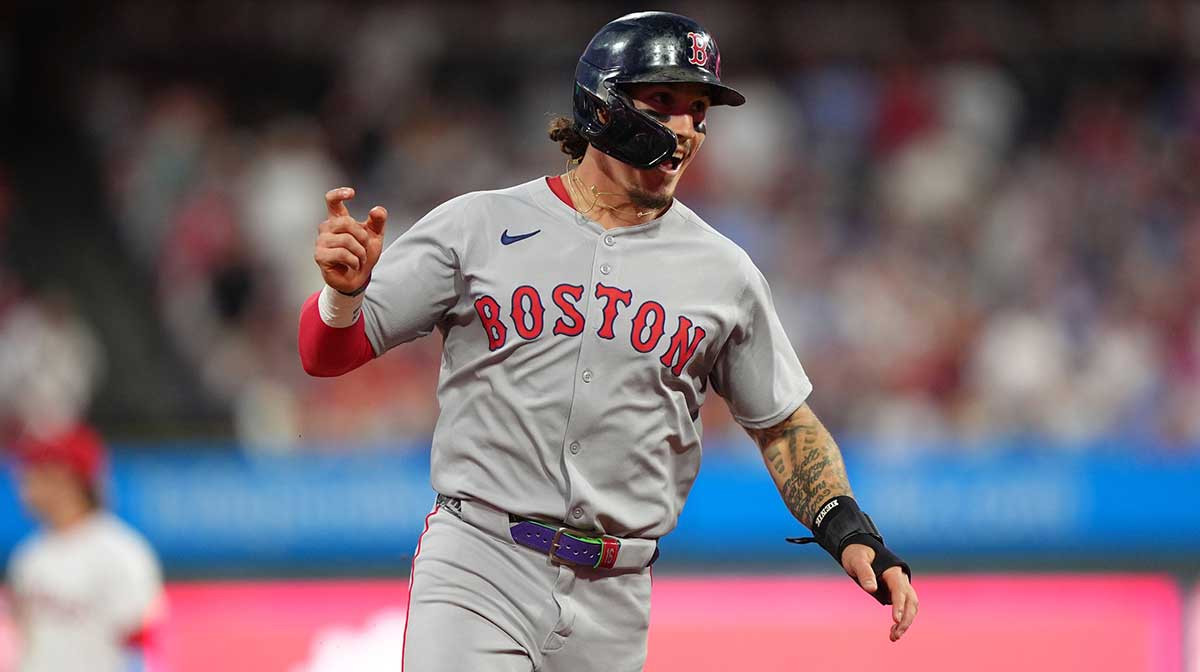 Boston Red Sox outfielder Jarren Duran (16) reacts as he rounds the bases to score against the Philadelphia Phillies in the fifth inning at Citizens Bank Park.