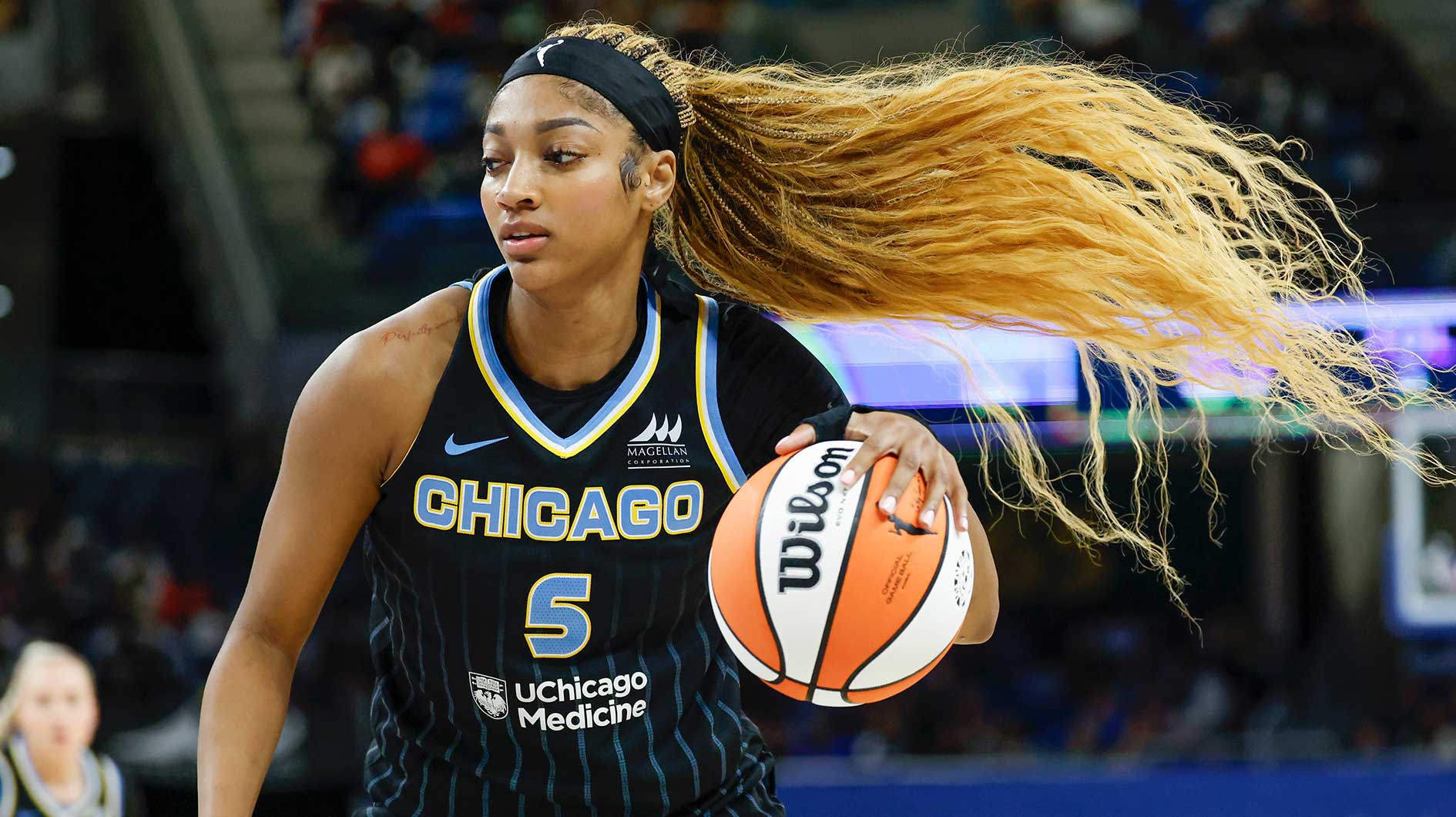 Chicago Sky forward Angel Reese (5) drives to the basket against the Dallas Wings during the second half of a WNBA game at Wintrust Arena.
