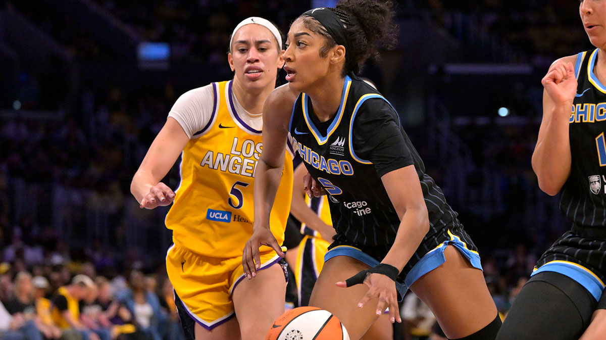 Chicago Sky forward Angel Reese (5) drives past Los Angeles Sparks forward Dearica Hamby (5) in the second half at Crypto.com Arena.