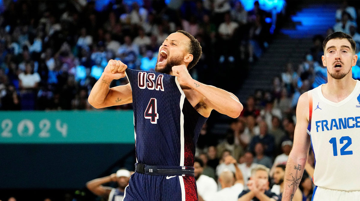 United States shooting guard Stephen Curry (4) celebrates in the second half against France in the men's basketball gold medal game during the Paris 2024 Olympic Summer Games at Accor Arena on Aug. 10, 2024.