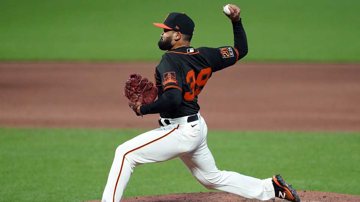San Francisco Giants relief pitcher Rico Garcia (39) throws a pitch during the sixth inning against the Texas Rangers at Oracle Park.
