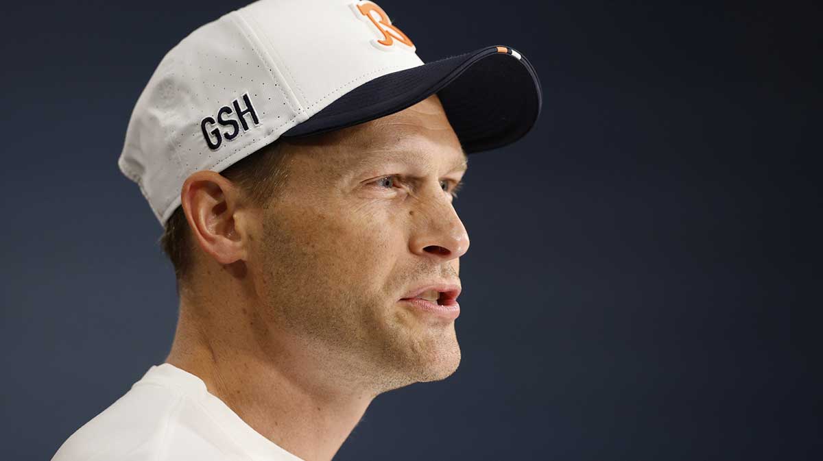 Chicago Bears head coach Ben Johnson speaks during training camp at Halas Hall.