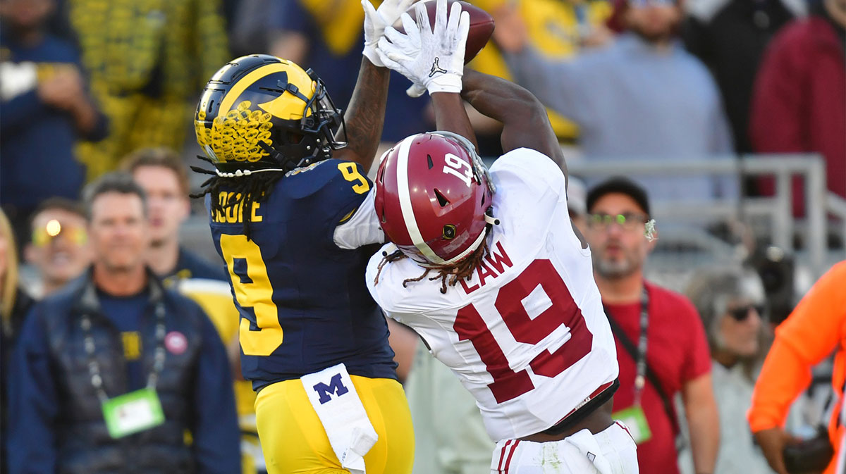 Alabama Crimson Tide wide receiver Kendrick Law (19) cannot make a catch against Michigan Wolverines defensive back Rod Moore (9) in the second quarter in the 2024 Rose Bowl college football playoff semifinal game at Rose Bowl.