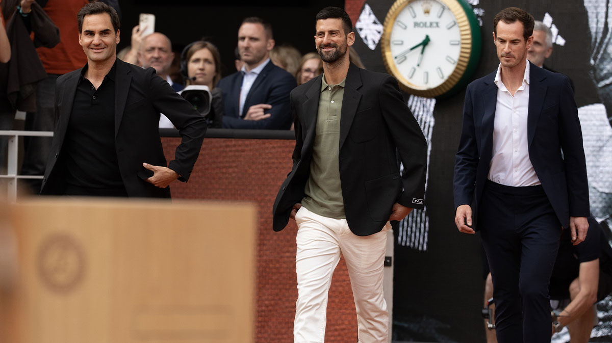 Roger Federer of Switzerland, Novak Djokovic of Serbia and Andy Murray of Great Britain enter the court during the presentation ceremony paying tribute to the career of Rafael Nadal of Spain on a packed Court Philippe Chatrier Courtday on day one at Roland Garros Stadium.