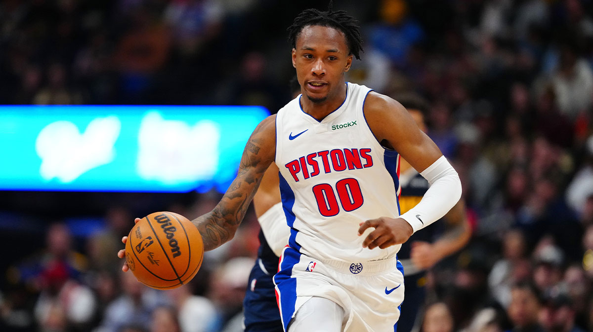 Detroit Pistons forward Ronald Holland II (00) dribbles up court in the second half against the Denver Nuggets at Ball Arena.