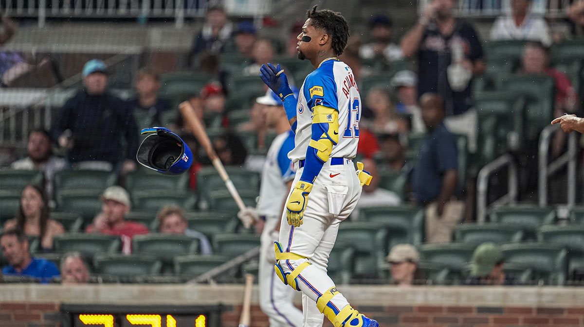 Atlanta Braves right fielder Ronald Acuna Jr (13) reacts after being called out on strikes against the Philadelphia Phillies during the sixth inning at Truist Park.