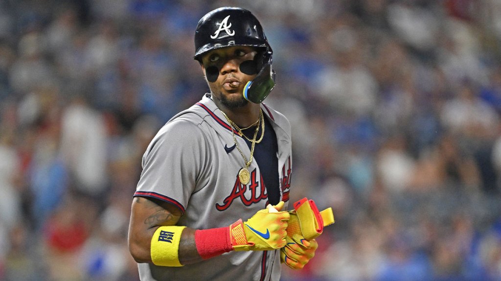 Atlanta Braves right fielder Ronald Acuna Jr. (13) looks toward the Kansas City Royals dugout after getting walked in the ninth inning at Kauffman Stadium.