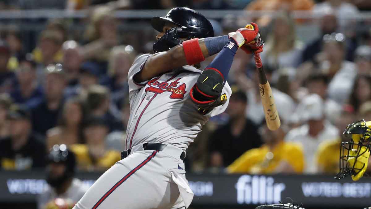 May 24, 2024; Pittsburgh, Pennsylvania, USA; Atlanta Braves right fielder Ronald Acuna Jr. (13) hits a three-run home run against the Pittsburgh Pirates during the eighth inning at PNC Park.