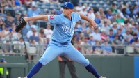 Kansas City Royals starting pitcher Kris Bubic (50) delivers a pitch against the Cleveland Guardians during the first inning at Kauffman Stadium.