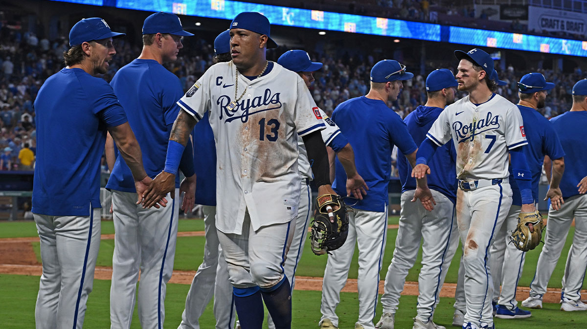 Kansas City Royals first baseman Salvador Perez (13) and shortstop Bobby Witt Jr. (7) celebrates with their teammates after beating the Pittsburgh Pirates at Kauffman Stadium.
